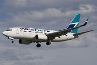 C-FBWJ @ CYYC - Westjet 737-700 - by Andy Graf-VAP
