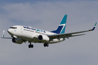 C-FTWJ @ CYYC - Westjet 737-700 - by Andy Graf-VAP