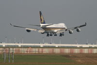 9V-SFJ @ EBBR - Several seconds before landing on RWY 02 - by Daniel Vanderauwera