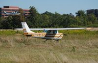 N2212J @ KISZ - Derelict at Blue Ash. Flamingo Air's Skipper on final in the background. - by Kevin Kuhn