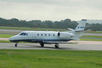 G-IPAX @ EGCC - G-IPAX Cessna 560XL taxiing at Manchester Airport - by David Burrell