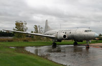 N114BF @ KOSH - Bereft of its engines, this rare Convairliner sits in a puddle at the Balser compound at Oshkosh. - by Daniel L. Berek