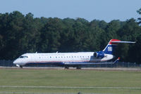 N720PS @ KMYR - 2004 Bombardier CL-600-2C10 waiting to take off in Myrtle Beach as the heat rises.. - by Richard T Davis