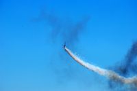 N921GR @ KFFC - flying through smoke rings - by Connor Shepard