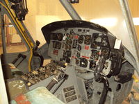 66-15185 @ ALO - The instrument panel, complete with bird droppings.  Birds were able to enter the chopper through a broken out chin bubble when it was on the pylon. - by Bookie