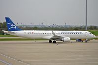 4O-AOC @ EGGW - Montenegro Airlines Embraer 190 brought in the National Soccer Team to play England - by Terry Fletcher