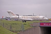 C-GCDS @ EGGW - Unusual scheme  on this 2003 Bombardier BD-700-1A10, c/n: 9137 at Luton - by Terry Fletcher