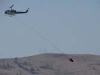 C-FTGK @ CYKA - ..Bell 205A heading for a fire. - by Blindawg