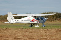 G-ORMW @ EGFH - Gower Flight Centre's Ikarus taxying. - by Roger Winser