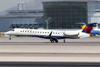 N14180 @ LAS - Delta Connection (ExpressJet Airlines) N14180 (FLT BTA7663) departing RWY 25R en route to Los Angeles Int'l (KLAX). - by Dean Heald