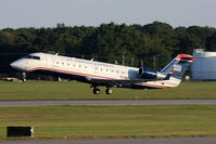 N415AW @ ORF - US Airways Express (Air Wisconsin) N415AW departing RWY 5. - by Dean Heald