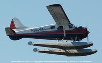 N91549 @ 52B - Over Moosehead Lake Maine. - by J.G. Handelman