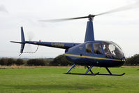 G-WSMW @ X5FB - Robinson R44 Raven lifting off at Fishburn Airfield in October 2010. - by Malcolm Clarke