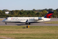 N8775A @ ORF - Delta Connection (Pinnacle Airlines) N8775A (FLT FLG4369) taxiing to RWY 23 via Taxiway Charlie for departure to Detroit Metro Wayne County Airport (KDTW). - by Dean Heald