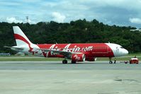 9M-AHW @ WBKK - Air Asia A320 at Kota Kinabalu - by Terry Fletcher