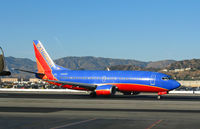 N363SW @ KBUR - Southwest 1993 737-3H4 on sunny Burbank Saturday in January (something out of Edwards AFB at 11 o'clock high?) - by Steve Nation