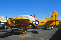 N91104 @ KCMA - North American T-28B in NAVY yellow cs as JM/764 BuAer 137764 (painted as NX2207Y) at Camarillo Airport (CA) on sunny, balmy January day - by Steve Nation