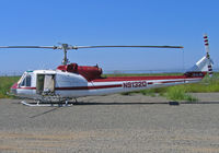 N91320 @ 07CL - Avag Inc 1962 Bell UH-1B rigged for spraying at Richvale, CA yard - by Steve Nation