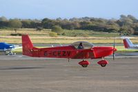 G-CEZV @ EGFH - Visiting Zodiac taxying. - by Roger Winser