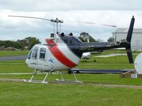 VH-JRE @ YMMB - Bell 206B at Moorabbin.