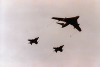 XM715 @ EGQL - Victor K.2 of 55 Squadron based at RAF Marham on an in-flight refuelling demonstration with two Phantom FG.1 fighters of 43 Squadron at the 1988 RAF Leuchars Airshow. - by Peter Nicholson