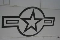 64-0519 @ KSKF - USAF symbol on a C130. - by Darryl Roach