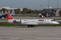 N8942A @ MSP - Still wearing NW Airlink colors in October 2010 - by Duncan Kirk