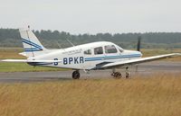 G-BPKR @ EGFP - Piper Cherokee Warrior taxying for departure - by Roger Winser