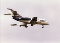 G-FRAE @ EGQS - Falcon 20 of FRA arriving at RAF Lossiemouth for the 1998 Joint Maritime Course. - by Peter Nicholson