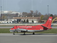 N417XJ @ KMSP - Still in NorthWest Airlink colours 6/nov/2010 after the Delta take over.Taken from inside the terminal at MSP - by steveowen