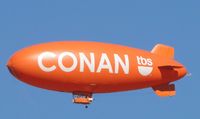 N620LG @ POC - Advertising Blimp for CONAN on tbs being flown over the northend of the drag races and north of Brackett (POC). Made several passes and then headed northwest over the hills - by Helicopterfriend