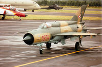 1874 @ EGVA - MiG-21 Fishbed of the Hungarian Air Force's Sky Hussars display team taxying to the active runway at the 1993 Intnl Air Tattoo at RAF Fairford. - by Peter Nicholson