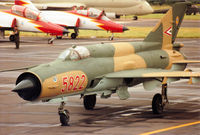 5822 @ EGVA - MiG-21 Fishbed of the Sky Hussars, the Hungarian Air Force display team, taxying to the active runway at the 1993 Intnl Air Tattoo at RAF Fairford. - by Peter Nicholson
