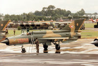 5540 @ EGVA - MiG-21 Fishbed of the Sky Hussars Hungarian Air Force display team on the flight-line at the 1993 Intnl Air Tattoo at RAF Fairford. - by Peter Nicholson