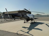 N420LE @ POC - Parked at Pomona PD helipad - by Helicopterfriend