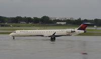 N691CA @ KMSP - Stormy day in MSP