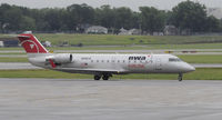 N8964E @ KMSP - Stormy day in MSP - by Todd Royer