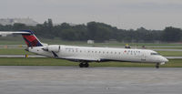 N690CA @ KOSH - Stormy day in MSP - by Todd Royer