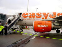 G-EZAW @ EHAM - disembarking from EZAW after our flight from EGGP - by Chris Hall