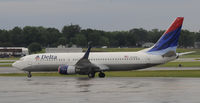 N378DA @ KMSP - Stormy day in MSP - by Todd Royer