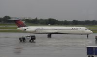 N787NC @ KMSP - Stormy day at MSP - by Todd Royer