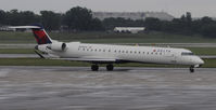 N695CA @ KMSP - Stormy day in MSP