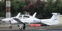 N511TS @ POC - Touching down after taxiway Coco on runway 26L - by Helicopterfriend