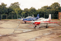 ZF380 @ EGVA - Tucano T.1, callsign Rivet 1, of the Central Flying School with companion ZF 406 on the flight-line at the 1993 Intnl Air Tattoo at RAF Fairford. - by Peter Nicholson