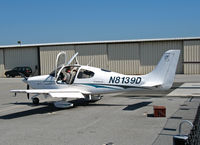 N8139D @ KSQL - Locally-based 2003 Cirrus Design SR20 of Lenair Aviation with doors open @ San Carlos, CA - by Steve Nation