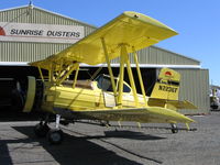 N2236F - Sunrise Dusters 1988 G-164B Ag-Cat with titles and rigged for spraying at old Sunrise Dusters strip off of Hwy 113 just across the Sacramento River from Knights Landing and 1-2 mile south of Bob's Flying Service strip (32CA) - she's now with Valley Air in - by Steve Nation