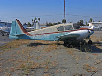 N3169P @ KRHV - Locally-based 1957 Piper PA-23 in te weeds looking long in the tooth on a brilliant sunshine day @ Reid-Hillview (originally Reid's Hillview) Airport, San Jose, CA - by Steve Nation