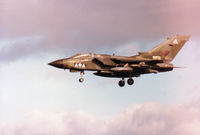 ZA552 @ EGQS - Tornado GR.1 of 2 Squadron on final approach to Runway 23 at RAF Lossiemouth in September 1990. - by Peter Nicholson
