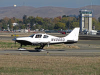 N400RD @ KCCR - Locally-based 2005 Lancair LC41-550FG Columbia 400 taxiing to RWY 1L with tower in background @ Buchanan Field, Concord, CA - by Steve Nation