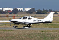 N400RD @ KCCR - Locally-based 2005 Lancair LC41-550FG Columbia 400 fast taxis to RWY 1L with oil tank farm in background @ Buchanan Field, Concord, CA - by Steve Nation